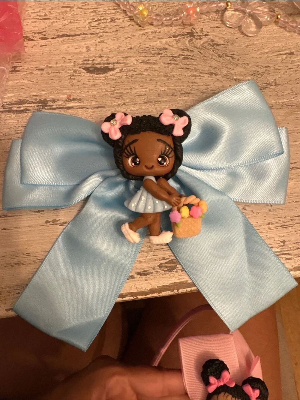 Custom clay Blue Bow Hair Clip with Cute Doll Accent